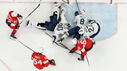 Image was captured using a remote camera positioned above the field of play.) Antoine Keller #30 of Team France makes a save in the third period during the Men's Preliminary Group A match between Switzerland and France on day six of the Milano Cortina 2026 Winter Olympic games at Milano Santagiulia Ice Hockey Arena on February 12, 2026 in Milan, Italy. (Photo by Jared C. Tilton/Getty Images)