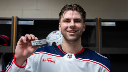 Adam fantilli first goal puck