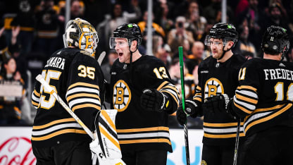 Coyle Ullmark celebrate Bruins