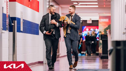 Washington Capitals arrive with puppies 