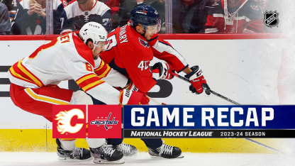 Capitals defeat Flames in shootout for 1st win under Carbery