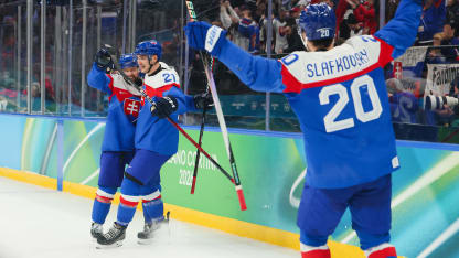 Tomas Tatar #90 of Team Slovakia celebrates with teammates Adam Ruzicka #21 and Juraj Slafkovsky #20 after scoring a goal in the third period during the Men's Quarterfinals Playoff match between Slovakia and Germany on day 12 of the Milano Cortina 2026 Winter Olympic games at Milano Santagiulia Ice Hockey Arena on February 18, 2026 in Milan, Italy. (Photo by Bruce Bennett/Getty Images)