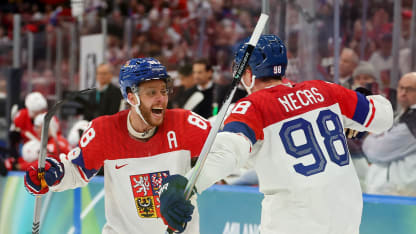 Martin Necas #98 of Team Czechia celebrates with teammate David Pastrnak #88 after scoring a goal in the third period during the Men's Preliminary Group A match between Switzerland and Czechia on day nine of the Milano Cortina 2026 Winter Olympic games at Milano Santagiulia Ice Hockey Arena on February 15, 2026 in Milan, Italy. (Photo by Gregory Shamus/Getty Images)