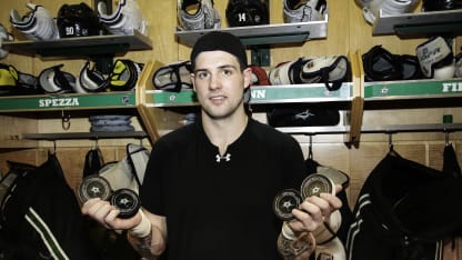 2015 - Benn poses with four pucks after clinching Art Ross Trophy