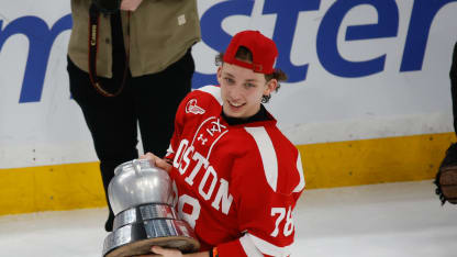 Sascha Boumedienne #78 of the Boston University Terriers celebrates with the Beanpot trophy after a win against the Boston College Eagles during NCAA hockey in the championship game of the annual Beanpot Hockey Tournament at TD Garden on February 10, 2025 in Boston, Massachusetts. The Terriers won 4-1. (Photo by Richard T Gagnon/Getty Images)