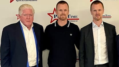 Brian Burke and the Sedins from HHOF no badge