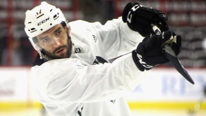 Patrice Bergeron visits Boston Bruins practice talks with young forwards