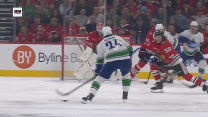 VAN@CHI: DeBrusk scores goal against Arvid Soderblom