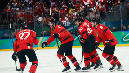 Shea Theodore #27 of Team Canada celebrates with teammates after scoring a goal in the third period during the Men's Semifinals Playoff match between Canada and Finland on day fourteen of the Milano Cortina 2026 Winter Olympic games at Milano Santagiulia Ice Hockey Arena on February 20, 2026 in Milan, Italy. (Photo by Elsa/Getty Images)