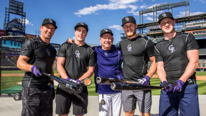 Members of the Colorado Avalanche visit Coors Field