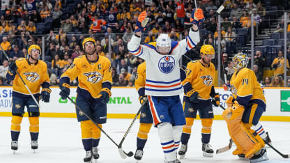 Corey Perry #90 of the Edmonton Oilers celebrates a goal against Juuse Saros #74 and Roman Josi #59 of the Nashville Predators during an NHL game at Bridgestone Arena on October 17, 2024 in Nashville, Tennessee. (Photo by John Russell/NHLI via Getty Images)