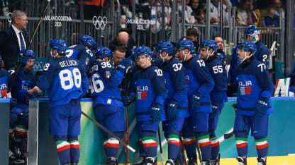 Dustin Gazley #10 of Team Italy celebrates with teammates after scoring a goal in the third period during the Men's Preliminary Group B match between Italy and Slovakia on day seven of the Milano Cortina 2026 Winter Olympic games at Milano Rho Ice Hockey Arena on February 13, 2026 in Milan, Italy. (Photo by Elsa/Getty Images)