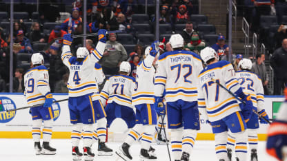 The Buffalo Sabres celebrate after defeating the New York Islanders at UBS Arena on December 23, 2024 in Elmont, New York. (Photo by Andrew Mordzynski/Getty Images)