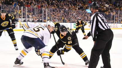 Ryan Spooner takes a faceoff.