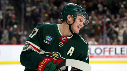 Kaprizov flips in a backhand shot