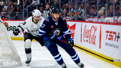 Nino Niederreiter #62 of the Winnipeg Jets and Adrian Kempe #9 of the Los Angeles Kings chase the puck during second period action at Canada Life Centre on January 10, 2025 in Winnipeg, Manitoba, Canada. (Photo by Jonathan Kozub/NHLI via Getty Images)