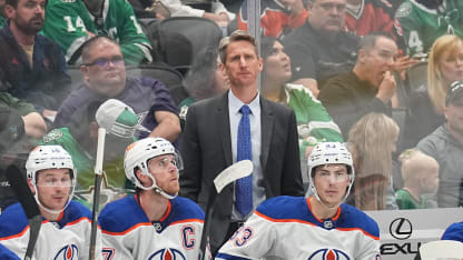 Kris Knoblauch watches the action from behind the bench against the Dallas Stars at the American Airlines Center on October 19, 2024 in Dallas, Texas.