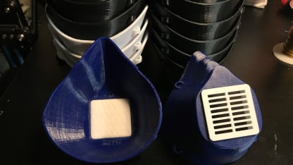 Tampa Bay Lightning employee producing protective masks using 3D printer