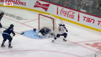 Comrie robs Johnson with the glove