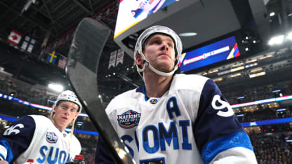Erik Haula #56 and Mikko Rantanen #96 of Team Finland look on during warm-up before the 4 Nations Face-Off game between the United States and Finland at Bell Centre on February 13, 2025 in Montreal, Quebec. (Photo by Andrea Cardin/4NFO/World Cup of Hockey via Getty Images)