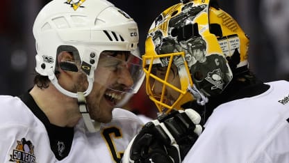 Sidney Crosby #87 and goalie Marc-Andre Fleury #29 of the Pittsburgh Penguins celebrate following the Penguins 2-0 win over the Washington Capitals in Game Seven of the Eastern Conference Second Round during the 2017 NHL Stanley Cup Playoffs at Verizon Center on May 10, 2017 in Washington, DC. (Photo by Patrick Smith/Getty Images)