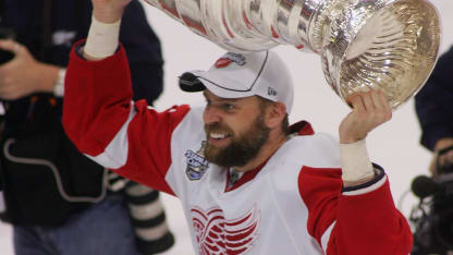 PITTSBURGH - JUNE 04: Tomas Holmstrom #96 of the Detroit Red Wings celebrates with the Stanley Cup after defeating the Pittsburgh Penguins in game six of the 2008 NHL Stanley Cup Finals at Mellon Arena on June 4, 2008 in Pittsburgh. Pennsylvania. The Red Wings defeated the Penguins 3-2 to win the Stanley Cup Finals 4 games to 2. (Photo by Jim McIsaac/Getty Images)
