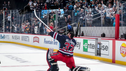 Goaltender Connor Hellebuyck #37 of the Winnipeg Jets celebrates on the ice after receiving first star honours following a 4-1 victory over the Dallas Stars at the Canada Life Centre on November 9, 2024 in Winnipeg, Manitoba, Canada. (Photo by Darcy Finley/NHLI via Getty Images)