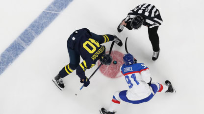 Elias Pettersson #40 of Team Sweden and Matus Sukel #91 of Team Slovakia face off in the first period during the Men's Preliminary Group B match between Sweden and Slovakia on day eight of the Milano Cortina 2026 Winter Olympic games at Milano Santagiulia Ice Hockey Arena on February 14, 2026 in Milan, Italy. (Photo by Jared C. Tilton/Getty Images)