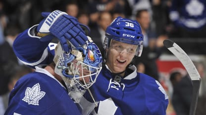 Jonas Gustavsson #50 and Carl Gunnarsson #36 of the Toronto Maple Leafs celebrate the teams win over the Winnipeg Jets during NHL game action January 5, 2012 at Air Canada Centre in Toronto, Ontario, Canada. (Photo by Graig Abel/NHLI via Getty Images