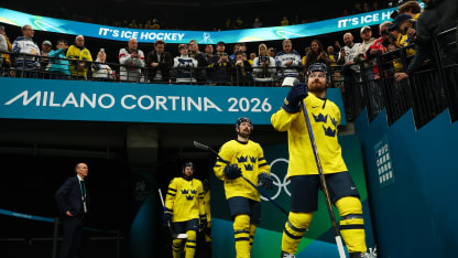 Mika Zibanejad #93, Filip Forsberg #9 and Rasmus Andersson #4 of Team Sweden walk out to the ice prior to the Men's Preliminary Group B match between Finland and Sweden on day seven of the Milano Cortina 2026 Winter Olympic games at Milano Santagiulia Ice Hockey Arena on February 13, 2026 in Milan, Italy. (Photo by Gregory Shamus/Getty Images)