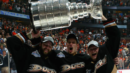 Dustin Penner #17, Ryan Getzlaf #15 and Corey Perry #10 of the Anaheim Ducks celebrate lifting the Stanley Cup after defeating the Ottawa Senators in Game Five of the 2007 Stanley Cup finals on June 6, 2007 at Honda Center in Anaheim, California. The Ducks defeated the Senators 6-2 to win the Stanley Cup Finals 4 games to 1. (Photo by Dave Sandford/Getty Images)