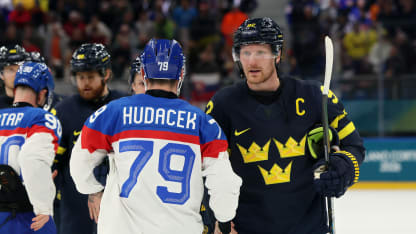 Gabriel Landeskog #92 of Team Sweden shakes hands wth Libor Hudacek #79 of Team Slovakia after the Men's Preliminary Group B match between Sweden and Slovakia on day eight of the Milano Cortina 2026 Winter Olympic games at Milano Santagiulia Ice Hockey Arena on February 14, 2026 in Milan, Italy. (Photo by Bruce Bennett/Getty Images)