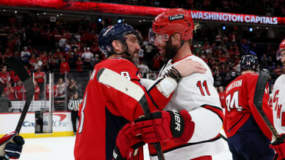 Alex Ovechkin #8 of the Washington Capitals greets Jordan Staal #11 of the Carolina Hurricanes following Game Five of the Second Round of the 2025 Stanley Cup Playoffs at Capital One Arena on May 15, 2025 in Washington, DC. Carolina defeated Washington 3-1. (Photo by Bruce Bennett/Getty Images)