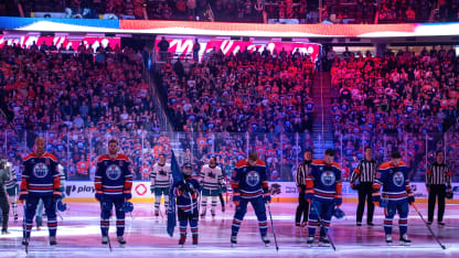 Darnell Nurse #25, Connor McDavid #97, Connor Brown #28, Jeff Skinner #53 and Troy Stecher #51 of the Edmonton Oilers stand with the Rona Skater for the singing of the national anthem prior to prior to the game against the San Jose Sharks at Rogers Place on April 11, 2025, in Edmonton, Alberta, Canada. (Photo by Leila Devlin/Getty Images)