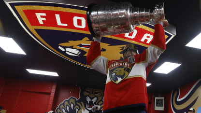 Sam Reinhart #13 of the Florida Panthers lifts the Stanley Cup in to the locker room after their win over the Edmonton Oilers in Game Six of the 2025 Stanley Cup Final at the Amerant Bank Arena on June 17, 2025 in Sunrise, Florida. (Photo by Eliot J. Schechter/NHLI via Getty Images)