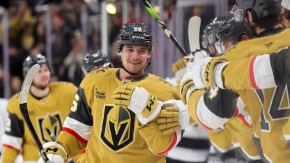 Alexander Holtz #26 of the Vegas Golden Knights celebrates with teammates on the bench after scoring a third-period goal against the Los Angeles Kings during their game at T-Mobile Arena at T-Mobile Arena on October 22, 2024 in Las Vegas, Nevada. The Golden Knights defeated the Kings 6-1. (Photo by Ethan Miller/Getty Images)