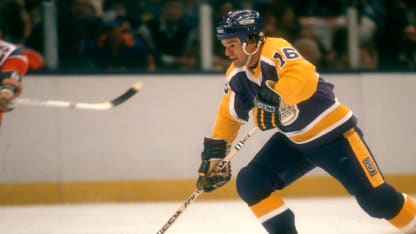 UNIONDALE, NY - 1983: Marcel Dionne #16 of the Los Angeles Kings skates with the puck during an NHL game against the New York Islanders circa 1983 at the Nassau Coliseum in Uniondale, New York. (Photo by Bruce Bennett Studios via Getty Images Studios/Getty Images)