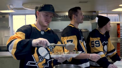 Penguins Serve Thanksgiving Meal
