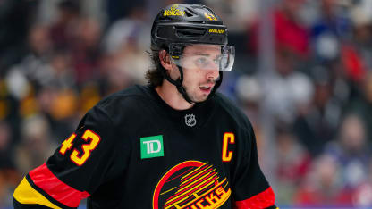 Quinn Hughes Canucks blessure bas du corps