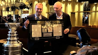 Lidstrom receives Borje Salming award from Mats Sundin