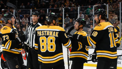 Tyler Johnson #90 of the Boston Bruins celebrates his goal against the Philadelphia Flyers with his teammates Pavel Zacha #18, Charlie McAvoy #73 and David Pastrnak #88 during the third period