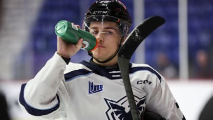 Ethan Gauthier drinking water