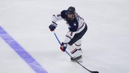 ALLENTOWN, PA - MARCH 30: UConn Huskies Defenseman Viking Gustafsson Nyberg (6) passes the puck during the second period of the NCAA Men's Ice Hockey Regional Final game between the UConn Huskies and the Penn State Nittany Lions on March 30, 2025, at PPL Center in Allentown, PA. (Photo by Gregory Fisher/Icon Sportswire via Getty Images)
