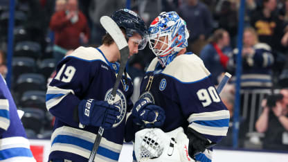 Columbus Blue Jackets center Adam Fantilli (19) and Columbus Blue Jackets goaltender Elvis Merzlikins (90) celebrate following the National Hockey League game between the Pittsburgh Penguins and Columbus Blue Jackets on November 15, 2024, at Nationwide Arena in Columbus, OH. (Photo by Frank Jansky/Icon Sportswire via Getty Images)