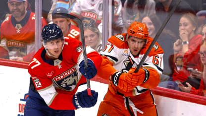 Panthers defenseman Niko Mikkola (77) and Anaheim Ducks left wing Cutter Gauthier (61) battle on the boards in the third period during the game between the Anaheim Ducks and the Florida Panthers on Tuesday, October 28, 2025 at the Amerant Bank Arena in Sunrise, FL.(Photo by Chris Arjoon/Icon Sportswire via Getty Images)