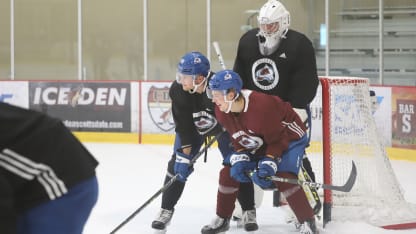 Sampo Ranta, Nate Clurman, and Justus Annunen laughing at Practice for Rookie Faceoff 2021