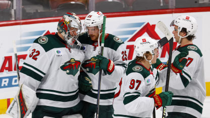 Teammates congratulate goaltender Filip Gustavsson #32 of the Minnesota Wild after the 5-1 win against the Florida Panthers at the Amerant Bank Arena on October 22, 2024 in Sunrise, Florida. (Photo by Joel Auerbach/Getty Images)