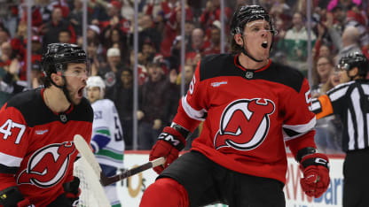 New Jersey Devils left wing Erik Haula (56) celebrates with New Jersey Devils center Paul Cotter (47) after scoring a goal during a NHL game between the Vancouver Canucks and New Jersey Devils at Prudential Center on March 24, 2025 in Newark, New Jersey. (Photo by Andrew Mordzynski/Icon Sportswire via Getty Images)
