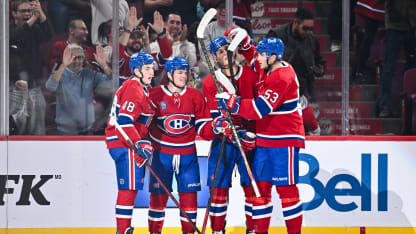 Cole Caufield #13 of the Montreal Canadiens celebrates his goal with teammates Lane Hutson #48, Juraj Slafkovský #20 and Noah Dobson #53 during the third period of the preseason game against the Ottawa Senators at the Bell Centre on October 4, 2025 in Montreal, Quebec, Canada. The Ottawa Senators defeated the Montreal Canadiens 3-1. (Photo by Minas Panagiotakis/Getty Images)