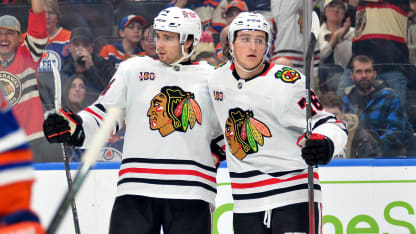 Lardis battles in front for goal